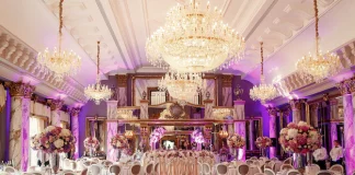 luxurious-dinner-hall-with-large-crystal-chandelier_8353-565